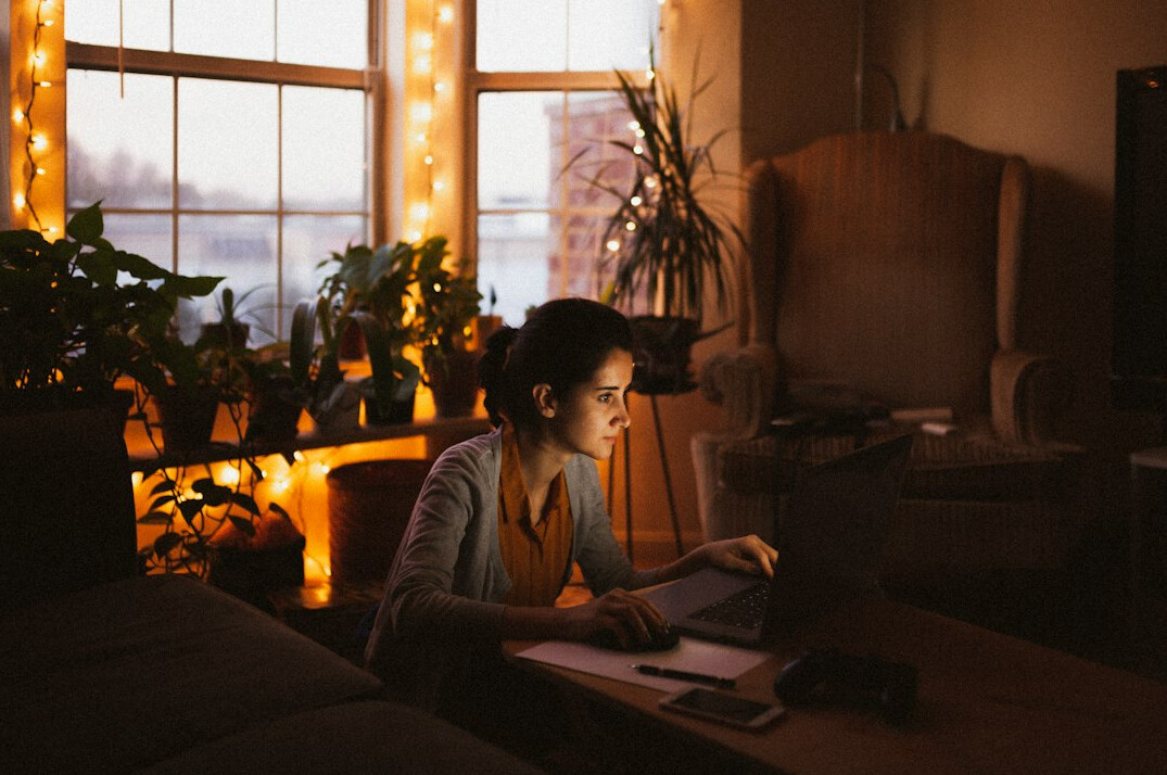 woman studying code at home