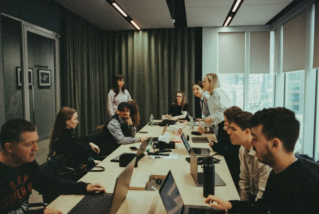 team of developers in meeting